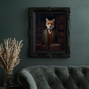 Dapper fox portrait in ornate black frame above green velvet sofa, creating a moody vintage reading nook