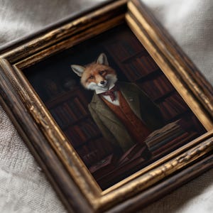Angled close-up of framed Victorian fox artwork highlighting painterly textures and antique-inspired gold frame