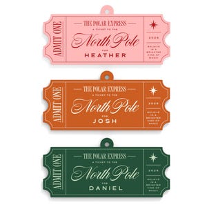 May include: Three rectangular ticket-shaped ornaments in pink, orange, and dark green. Each features the text "The Polar Express," "A Ticket to the North Pole," "Admit One," "2026," and "Believe in a Brighter Kind of Magic," with names Heather, Josh, and Daniel.