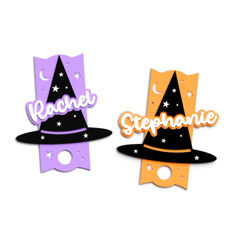May include: Two purple and orange Halloween door hangers with witch hats and names "Rachel" and "Stephanie" written in white.