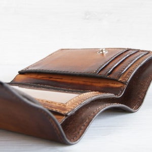 PortafoPortafoglio in pelle trifoldglio in pelle trifold interno