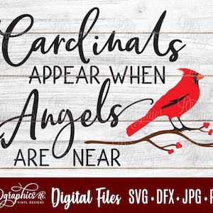 May include: A red cardinal perched on a branch with red berries. The text "Cardinals appear when angels are near" is written in black cursive font on a white wood background.