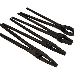 May include: Set of four black metal blacksmith tongs. The tongs are of varying sizes and are arranged in a staggered pattern.