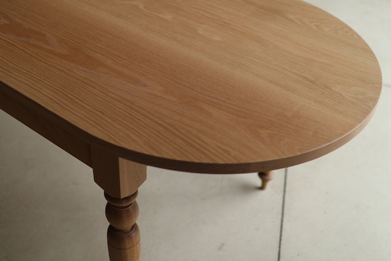 Modern French Country Dining Table, Oval Top, Turned Legs