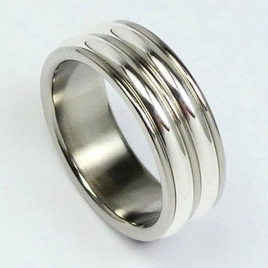 Polished titanium and silver ring. Titanium, silver 925 men&#39;s ring. Titanium, silver jewelry. Promise ring, engagementring.