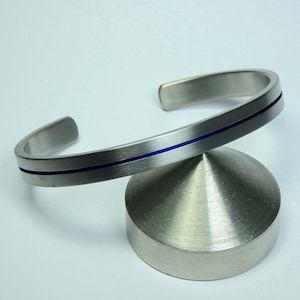 Solid grade 2 titanium men&#39;s size bracelet with blue anodized groove. Titanium jewelry. Men&#39;s jewelry.