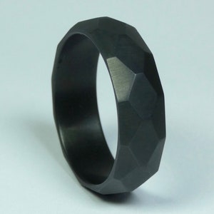 Black pure zirconium ring 36 facets. Hand crafted all around facetted zirconium ring. Zirconium jewelry.