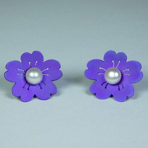 Pair of anodized titanium and 5 mm pearl hand crafted unique earstuds. Cherry blossom earstuds.