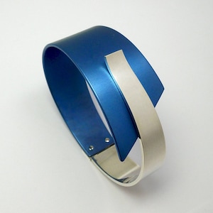 Anodized titanium and polished silver bracelet with invisible clasp.