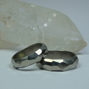 Pair of all around hand facetted grade 2 titanium wedding rings engagement rings. Titanium jewelry. Titanium wedding bands.
