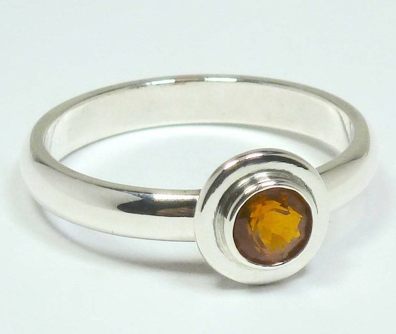 Fire opal silver ladies ring Facetted round fire opal and silver 925 ladies ring Fire opal from Mexico hand crafted ladies ring.