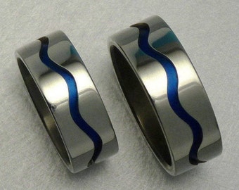 PAIR of blue titanium and silver wave rings / engagementrings.