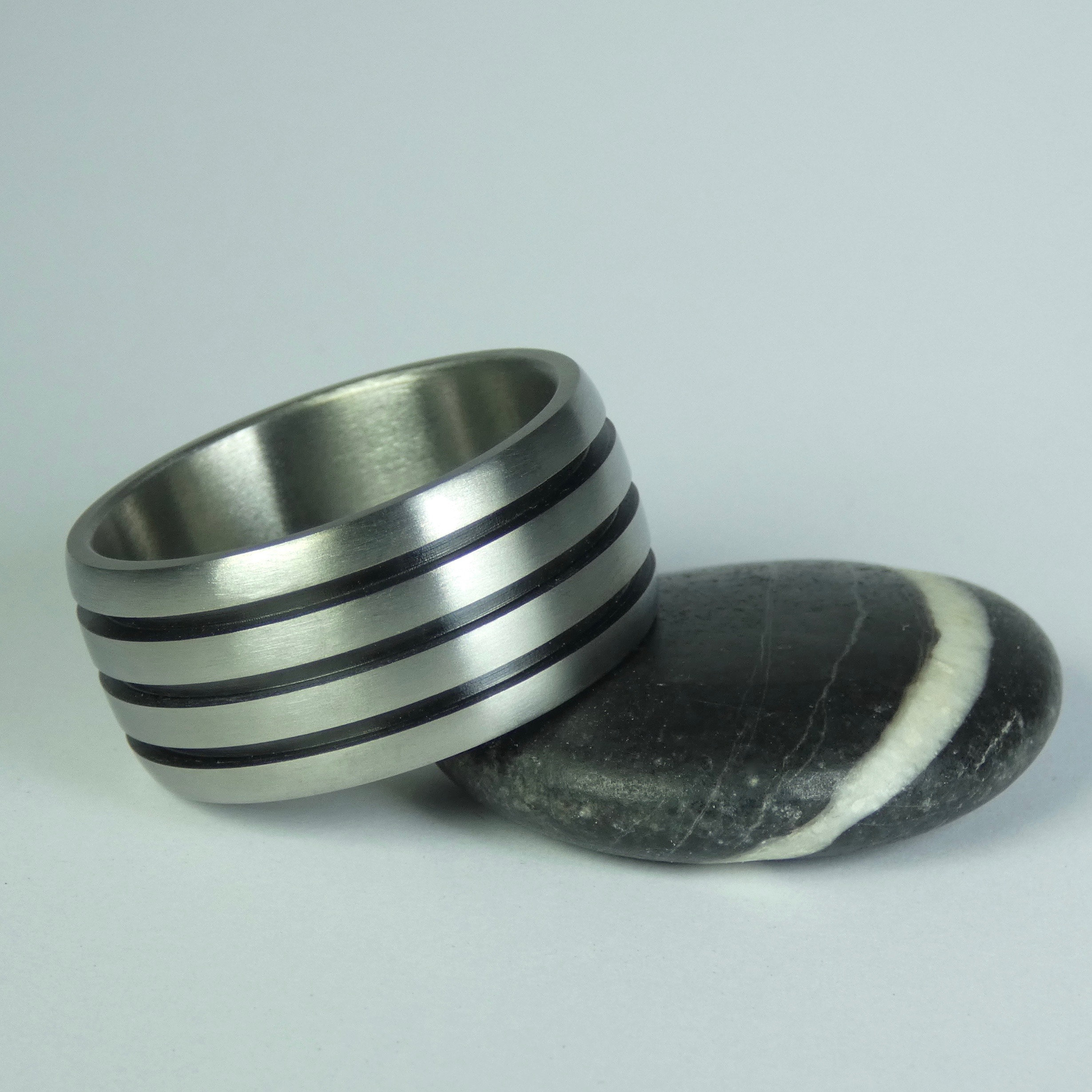 Simple Stainless Steel Ring with Black Line Design - China Finger Ring and  Towel Ring price | Made-in-China.com