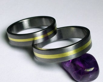 PAAR Trauringe aus reinem Tantal und 14K Gelbgold. Verlobungsringe.