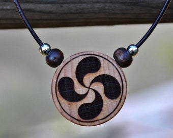 Wooden lauburu pendant, round necklace engraved with the Basque symbol of the four heads, personalized gift, handmade jewelry.