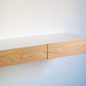 Minimalist white floating dressing table / vanity shelf with oak drawers