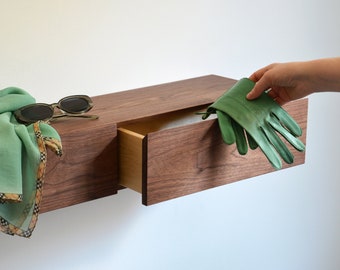 Floating entryway shelf / narrow entryway table with hidden drawers, made of walnut