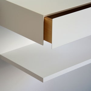 White floating nightstand with drawer and an extra shelf image 4