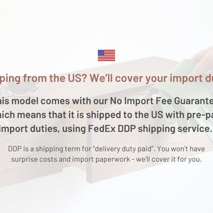 May include: A rectangular wooden storage box with a drawer, featuring text that reads: Shopping from the US? We'll cover your import duties. This model comes with our No Import Fee Guarantee, which means that it is shipped to the US with pre-paid import duties, using FedEx DDP shipping service. DDP is a shipping term for delivery duty paid.