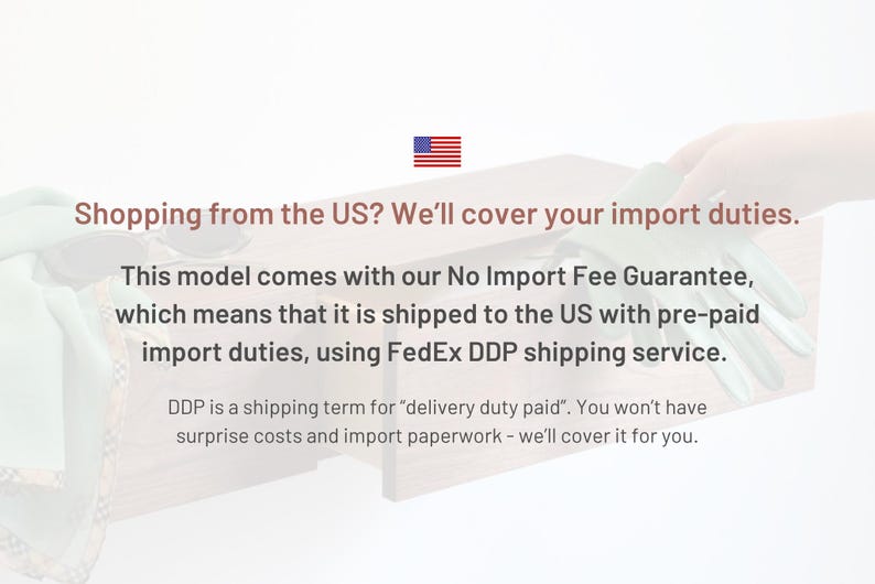May include: A rectangular wooden storage box with a drawer, featuring text that reads: Shopping from the US? We'll cover your import duties. This model comes with our No Import Fee Guarantee, which means that it is shipped to the US with pre-paid import duties, using FedEx DDP shipping service. DDP is a shipping term for delivery duty paid.