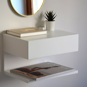 White floating nightstand with drawer and an extra shelf image 7