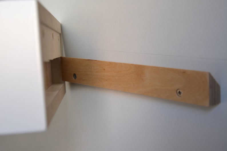 White floating nightstand with drawer and an extra shelf image 8