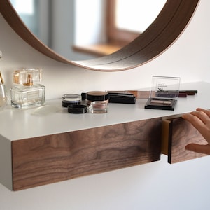 Minimalist white floating dressing table / vanity shelf with walnut drawers