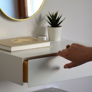 White floating nightstand with drawer and an extra shelf image 3