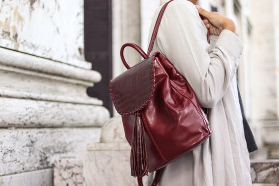 small red backpack purse