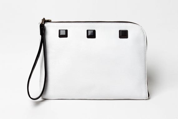 white leather wristlet