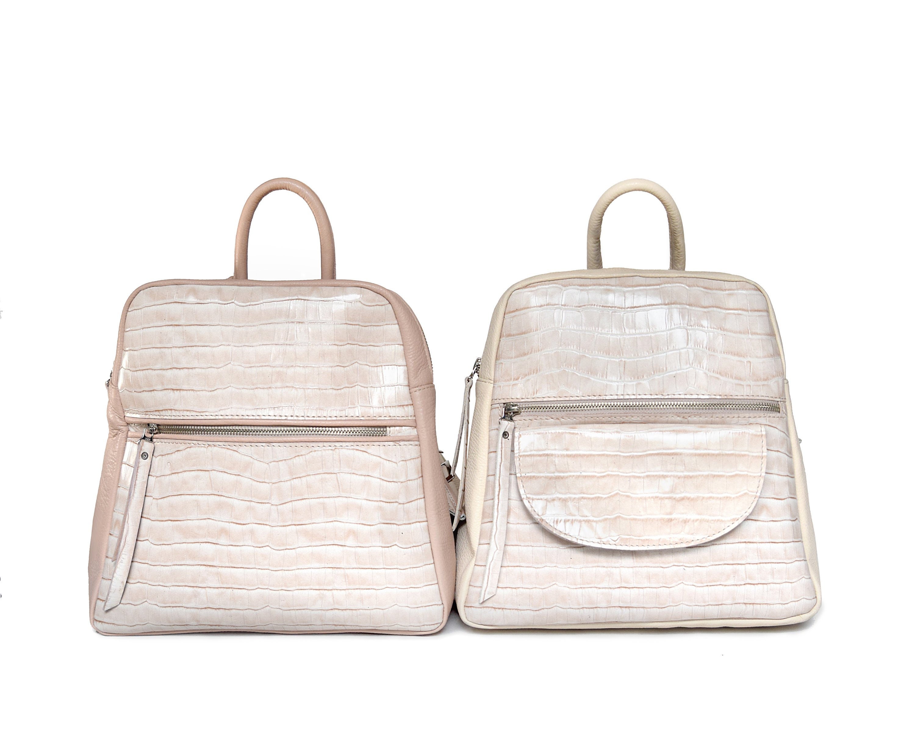 small pink backpack purse