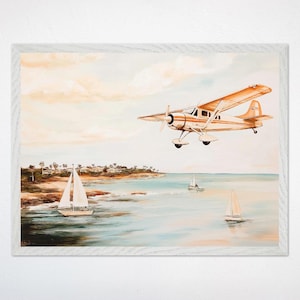 Lienzo de avión vintage, arte de habitación infantil de aventuras oceánicas, decoración de avión costero, póster infantil de género neutro, arte de pared para guardería.