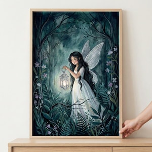 May include: A framed watercolour print depicting a fairy in a forest setting. The fairy, with long black hair and white wings, carries a lantern. The artwork uses a dark green and blue colour palette with floral and foliage details.