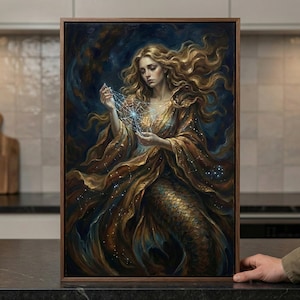 May include: A framed artwork depicts a mermaid with flowing blonde hair and a golden gown, holding a glowing web-like structure. The painting features a dark blue and gold color palette, with a focus on celestial elements and a mystical theme.