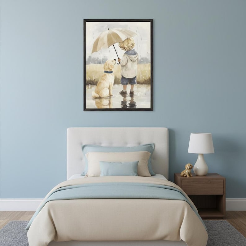 Kid's bedroom with a white upholstered bed and a nightstand. A framed illustration of a blonde child holding an umbrella over a golden retriever in a puddle hangs above the bed.