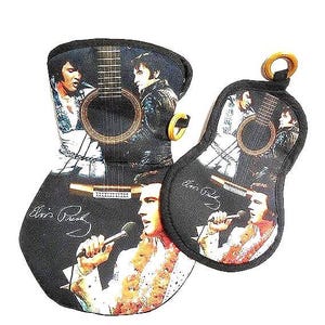 May include: Two black oven mitts featuring an image of Elvis Presley and a guitar. The larger mitt shows a full-length image of Elvis Presley holding a guitar. The smaller mitt features a close-up of Elvis Presley's face and a guitar.