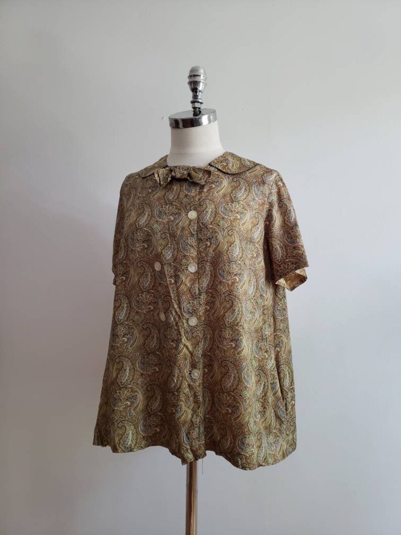 size mediumlarge ML 1970s paisley print button up short sleeve blouse with collar and bow Vintage 70s bohemian boho summer tent top
