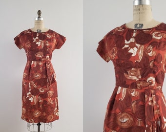 Vintage 1950s orange and red floral print silk wiggle dress, 50s mid century cocktail dress with fringe size small/medium S/M