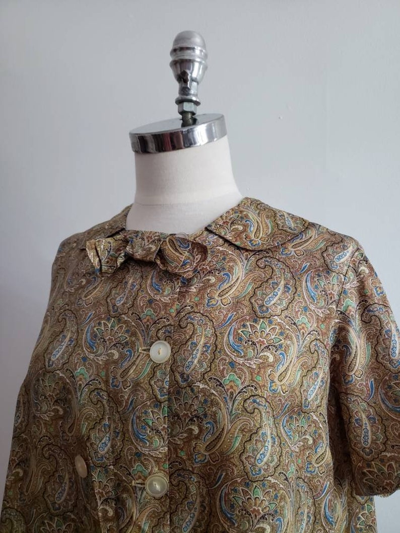 size mediumlarge ML 1970s paisley print button up short sleeve blouse with collar and bow Vintage 70s bohemian boho summer tent top