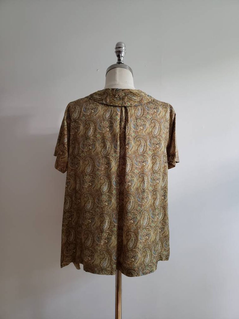size mediumlarge ML 1970s paisley print button up short sleeve blouse with collar and bow Vintage 70s bohemian boho summer tent top
