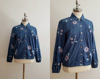 Vintage 80s, 1980s light denim bomber jacket with all over pink flower patches and embroidery, printed jean button up top, size medium M