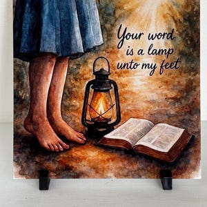 May include: Watercolor art print featuring a person's bare feet, a lit lantern, and an open book. The text "Your word is a lamp unto my feet" is written in elegant script. The artwork has warm, earthy tones.
