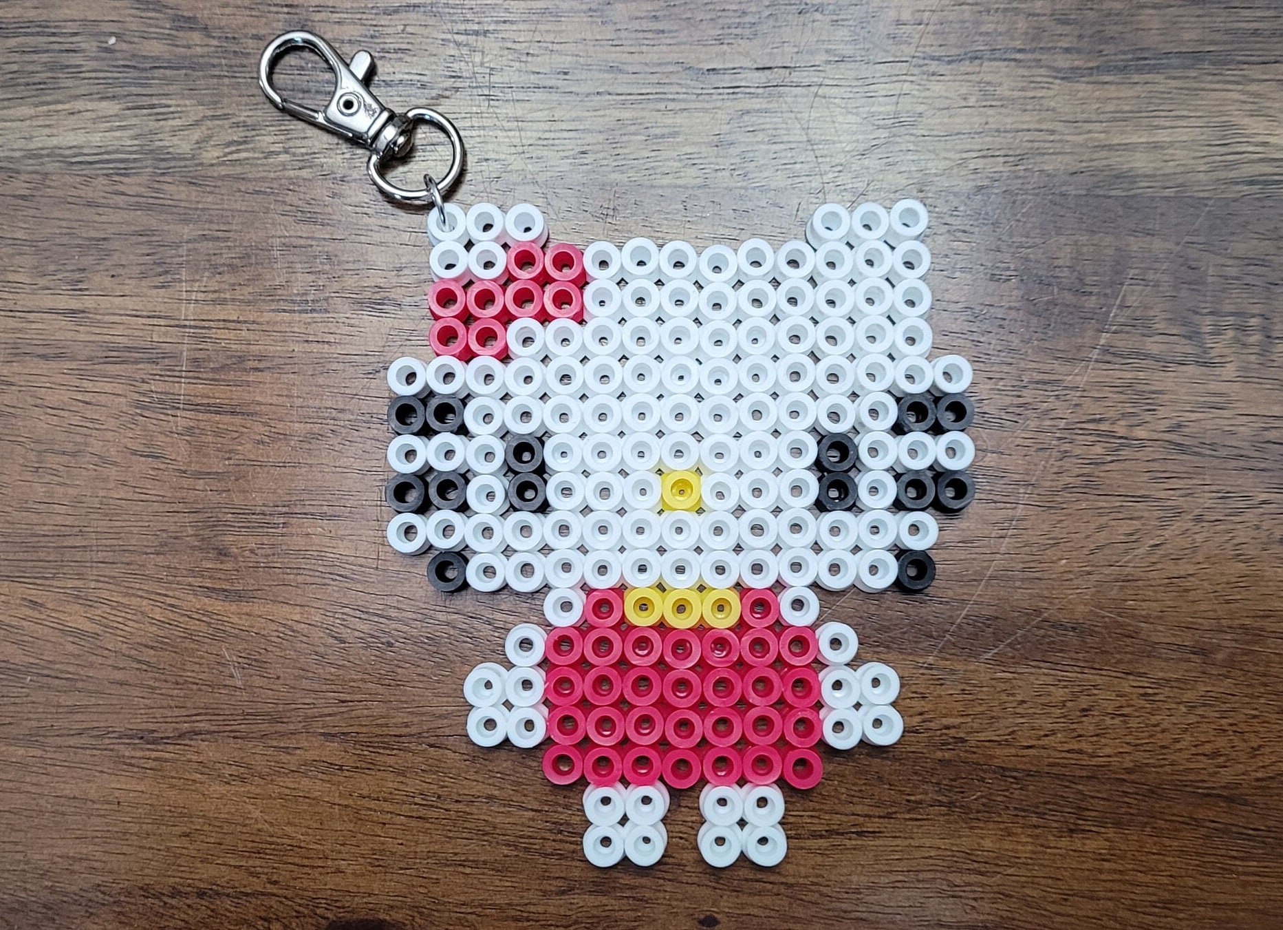 Hello Kitty Keychains Magnets Bracelets Necklaces  Hama beads design,  Perler patterns, Perler bead disney