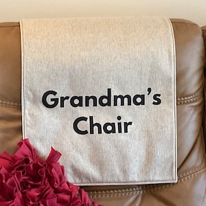 Headrest Cover  with saying “Grandma’s Chair”. 17x27. By: Bittlemen Co.