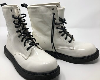 black boots with white soles