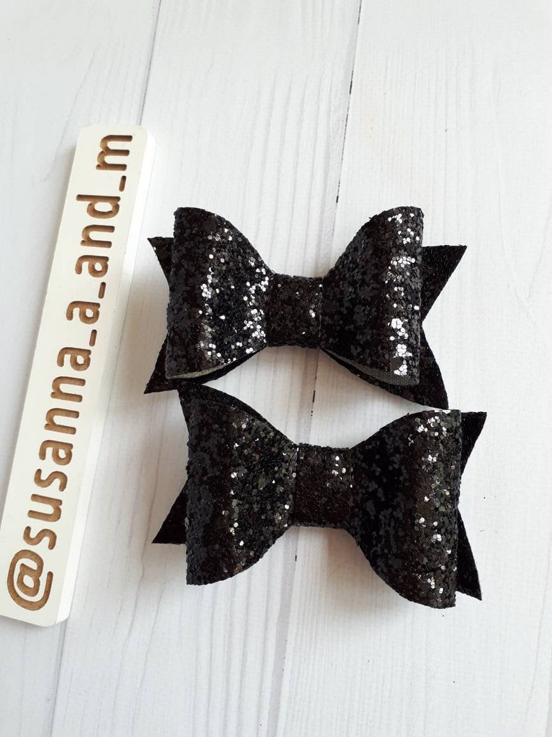 4/" Black And Silver Glitter hair bow on a Clip