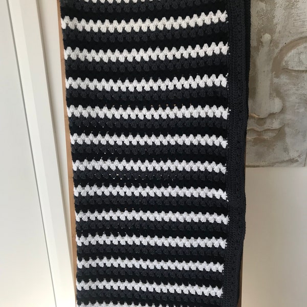 Handmade crochet monogram white, black and dark grey blanket.