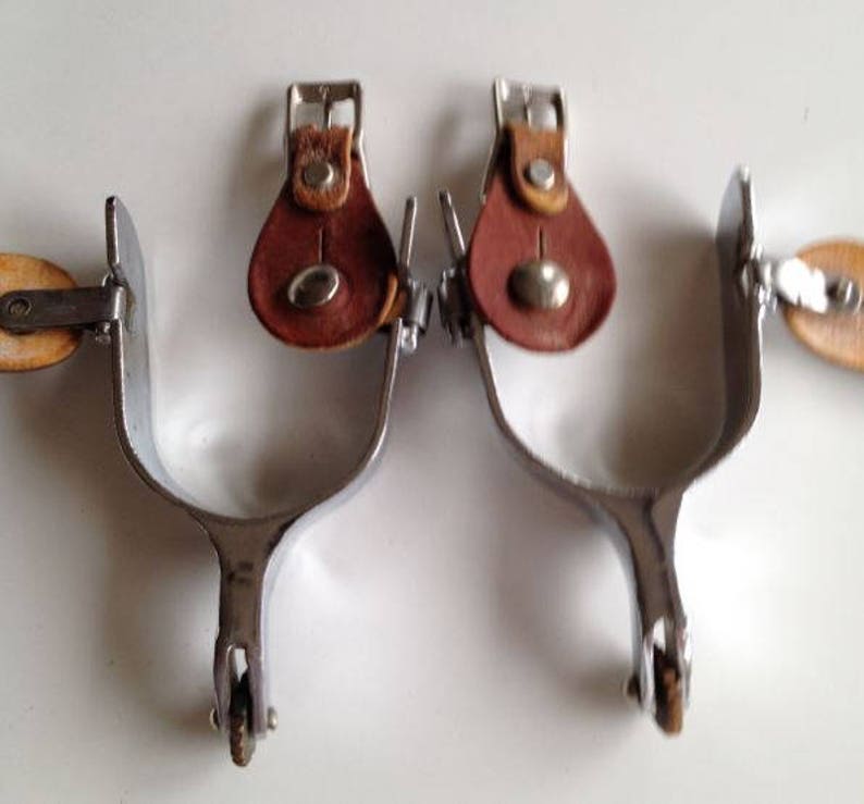 cowboy cowgirl rodeo Vintage heavy chrome over steel spurs with North /& Judd spur strap buckles shiny chrome in great shape brass rowels