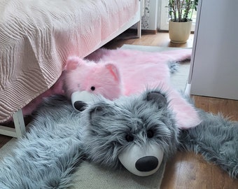 A Teddy Bear-shaped Carpet for a Child's Gray, Furry Teddy
