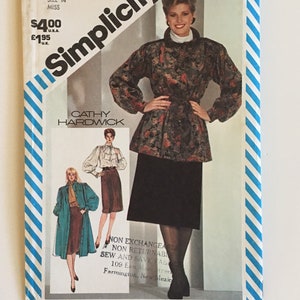 May include: Simplicity sewing pattern number 5641 for a jacket and skirt. The pattern is for a miss size 14. The pattern shows a woman wearing a black skirt and a floral patterned jacket. The pattern is for sale for $4.00 USD and £1.95 GBP.